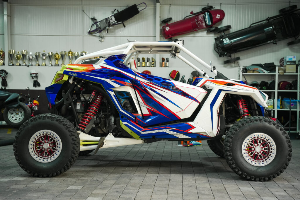 A colorful off-road buggy upgrading your motorbike’s paint job, giving your jetski a custom wrap, or transforming your UTV with personalized graphics and color schemes, we ensure flawless workmanship and long-lasting results.